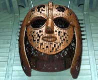 Fab large metal mask that adorns the wall of the exhibition centre at Sutton Hoo