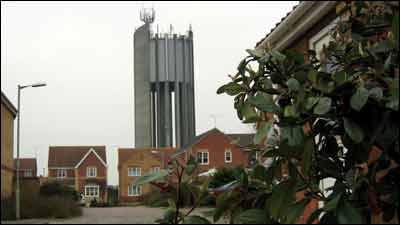 Towering above the nearly new houses